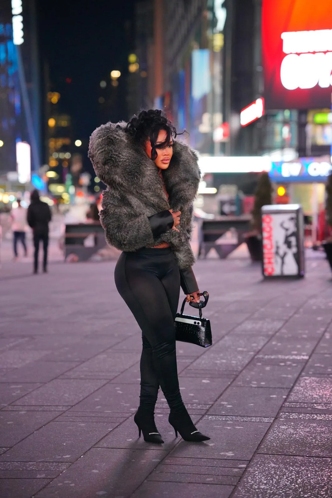 AltheaMink fur crop jacket worn in Times Square at night