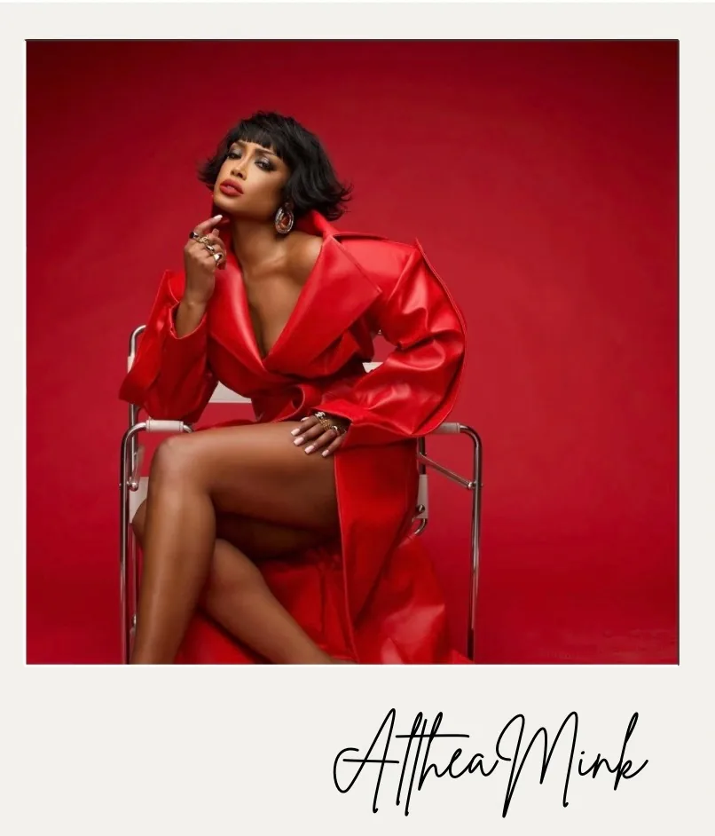 AltheaMink red leather oversized coat, seated studio portrait in a signed AltheaMink polaroid frame